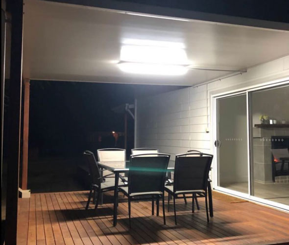 Back patio with new aluminium door leading into inside the house